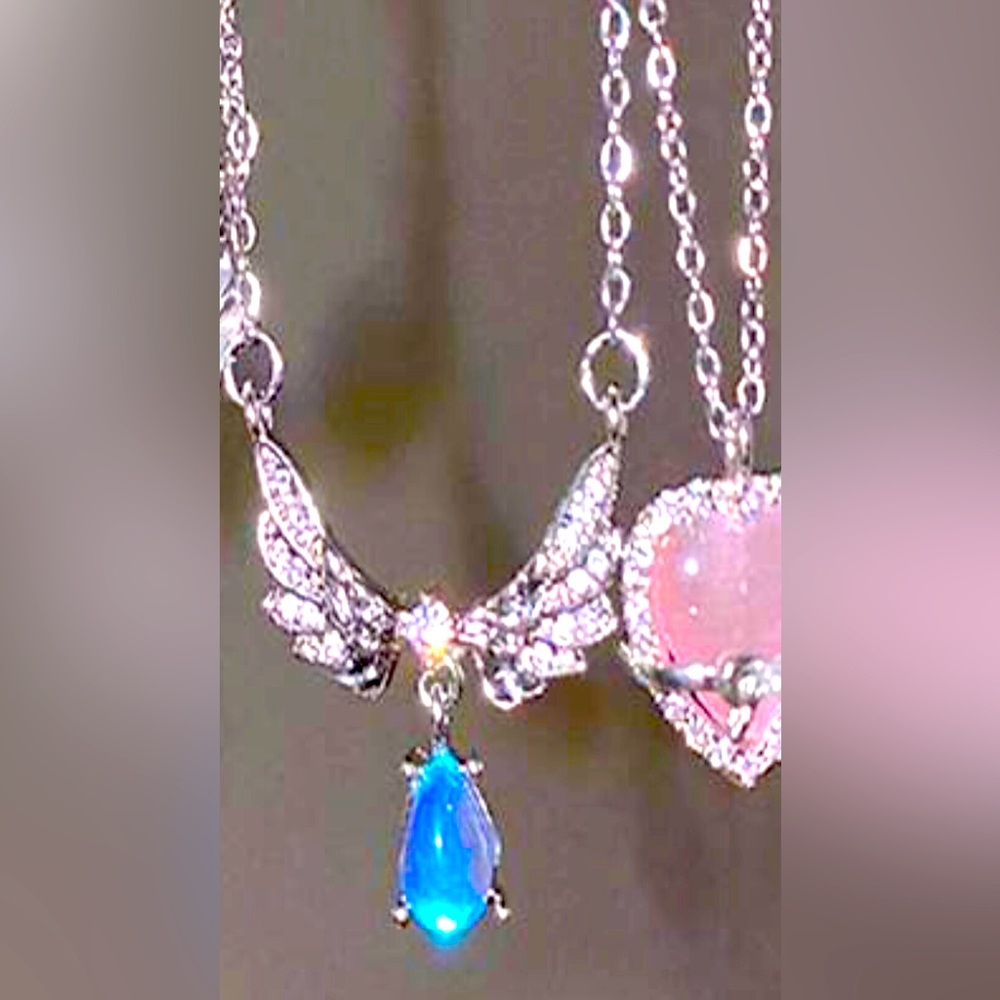 - Crystal angel wings pendant necklace. New